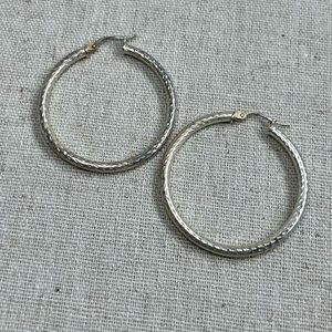 Sterling silver diamond cut hoop earrings